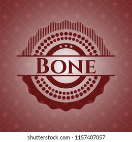 Bone badge with red background