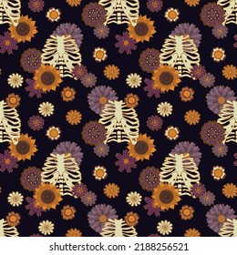 Bones and flowers boho Halloween seamless pattern. Chest with groovy daisies flowers. Magical vector illustration on a dark background.