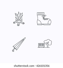Bonfire, umbrella and hiking boots icons. Park linear sign. Flat linear icons on white background. Vector