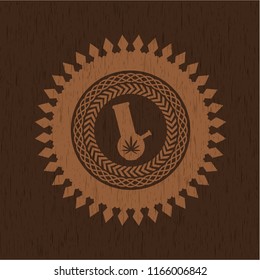 bong of marijuana icon inside badge with wood background