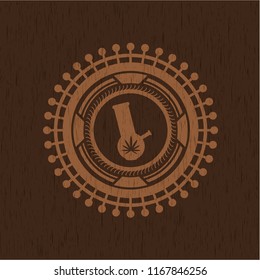 bong of marijuana icon inside badge with wood background