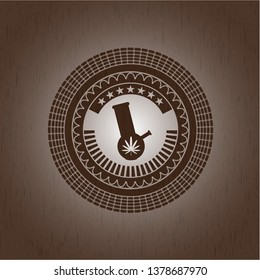 bong of marijuana icon inside badge with wood background