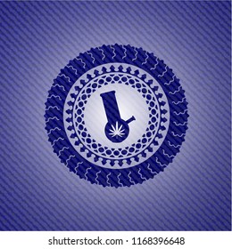 bong of marijuana icon inside emblem with jean background