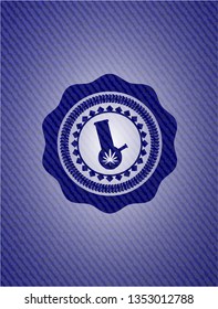 bong of marijuana icon inside emblem with denim texture
