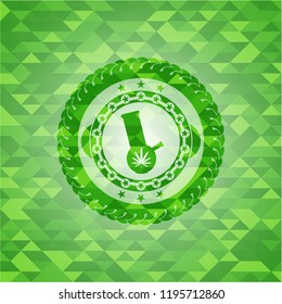 bong of marijuana icon inside green emblem with mosaic background