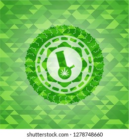 bong of marijuana icon inside green emblem with triangle mosaic background