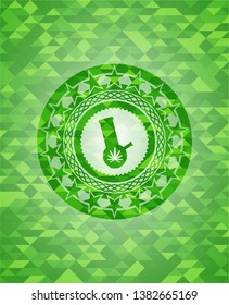 bong of marijuana icon inside green emblem with triangle mosaic background