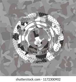bong of marijuana icon inside grey camouflage emblem