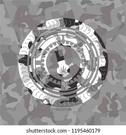 bong of marijuana icon inside grey camouflaged emblem