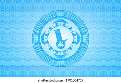 ícono de la marihuana dentro del emblema del estilo del agua.