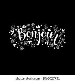 Bonjour (Hello) Paris card. Hand drawn phrase Hello Paris in french. Ink illustration. Modern brush calligraphy. Isolated on black background.