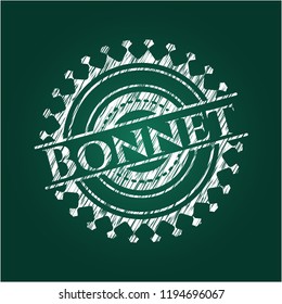 Bonnet on blackboard
