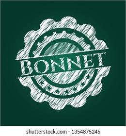 Bonnet on blackboard
