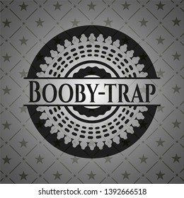 Booby-trap realistic black emblem. Vector Illustration. Detailed.