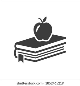 Icono de libro y manzana en fondo blanco