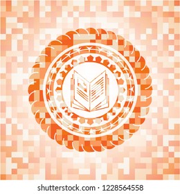 book icon inside abstract emblem, orange mosaic background