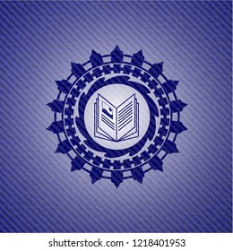 book icon inside badge with jean texture