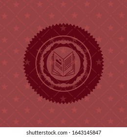 icono del libro en la placa con fondo rojo