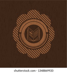 book icon inside badge with wooden background
