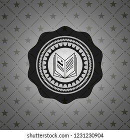 book icon inside black emblem. Vintage.