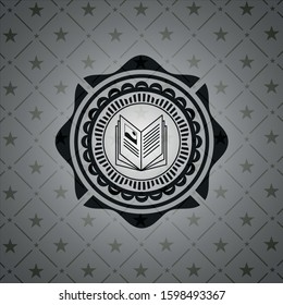 book icon inside black emblem