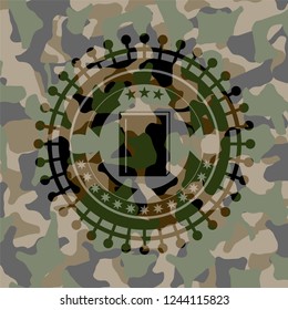 book icon inside camouflaged emblem