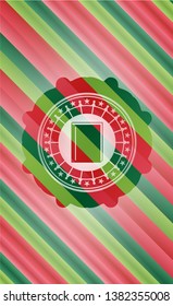 book icon inside christmas badge.