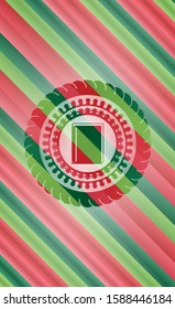 book icon inside christmas badge.