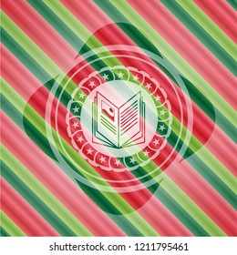 book icon inside christmas colors style emblem.