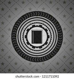 book icon inside dark badge or emblem