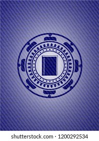 book icon inside emblem with denim high quality background