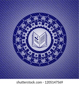 book icon inside emblem with jean background