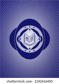 book icon inside emblem with jean texture