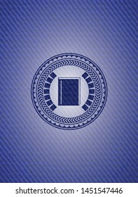 book icon inside emblem with jean texture