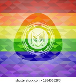 book icon inside emblem on mosaic background with the colors of the LGBT flag