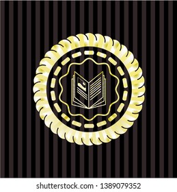 book icon inside gold emblem