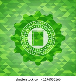 book icon inside green emblem. Mosaic background