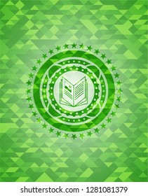 book icon inside green mosaic emblem