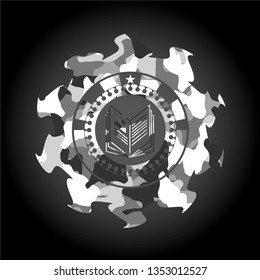 book icon inside grey camo emblem
