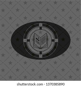 book icon inside realistic black emblem