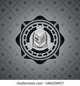 book icon inside realistic black emblem