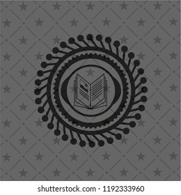 book icon inside realistic dark emblem