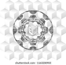 book icon inside realistic grey emblem with geometric cube white background
