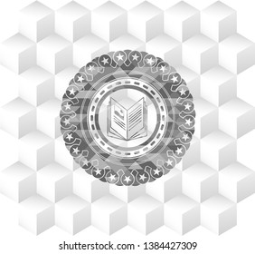 book icon inside realistic grey emblem with cube white background