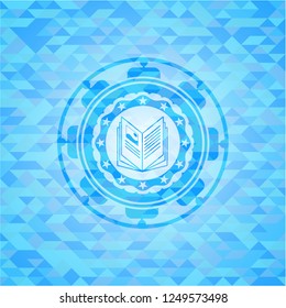 book icon inside realistic light blue mosaic emblem