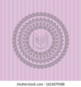 book icon inside realistic pink emblem