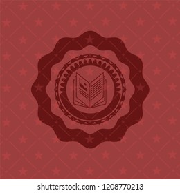 book icon inside realistic red emblem
