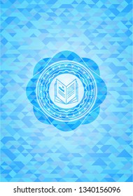 book icon inside realistic sky blue mosaic emblem