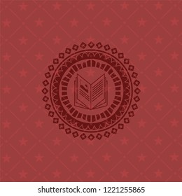 book icon inside red emblem. Vintage.