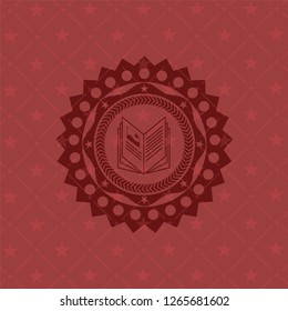 book icon inside retro red emblem